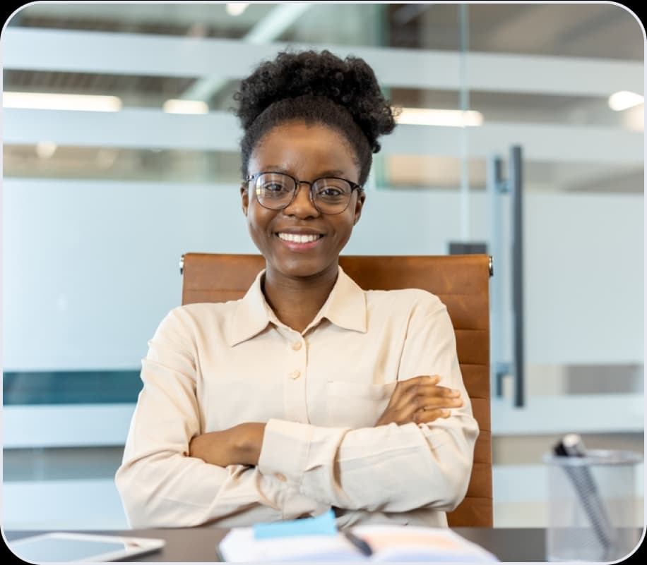 a black woman sitting in a chair